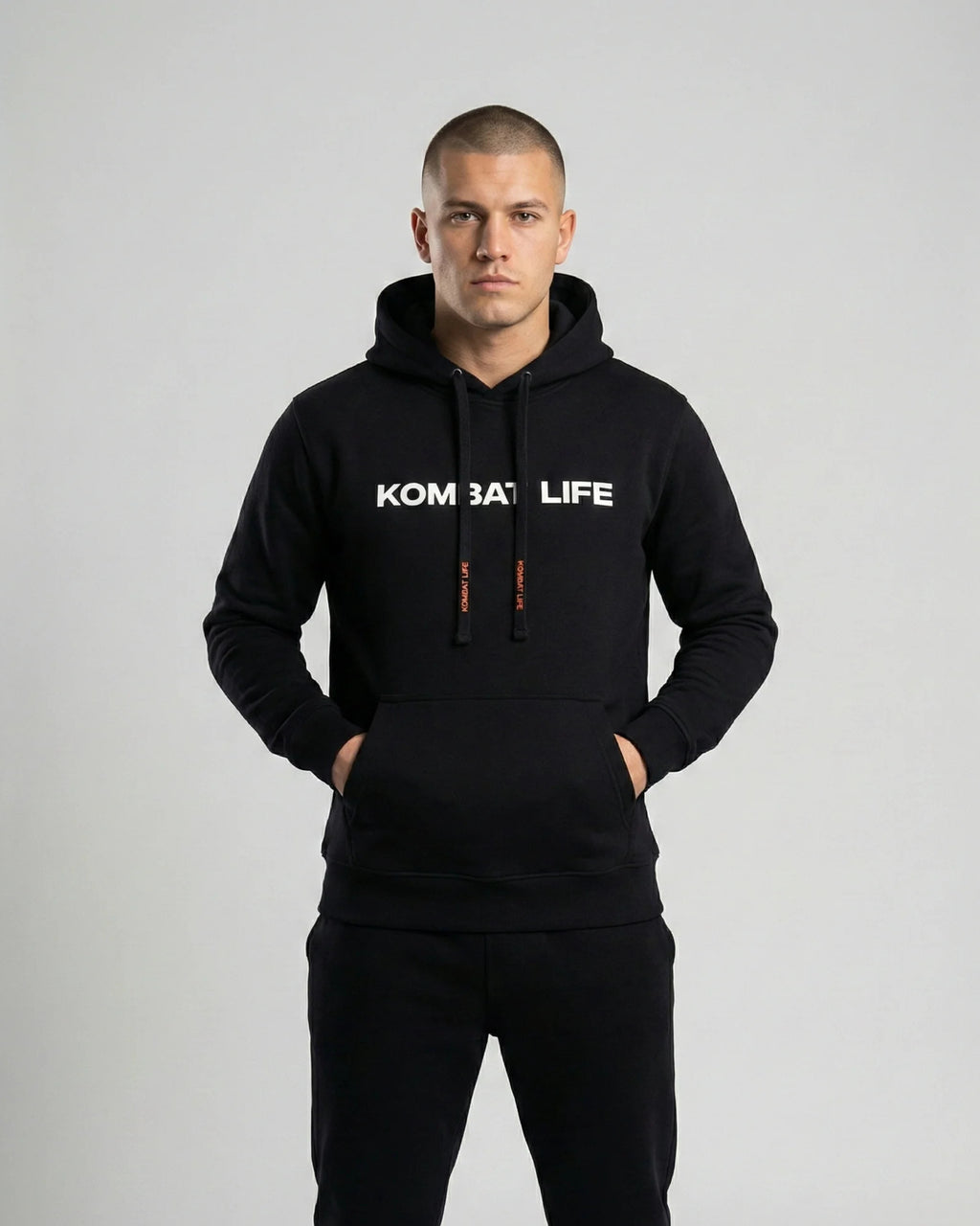 Hoodie negro Hunger Kombat Life sudadera con capucha streetwear fighter para entrenamiento y calle modelo vista delantera