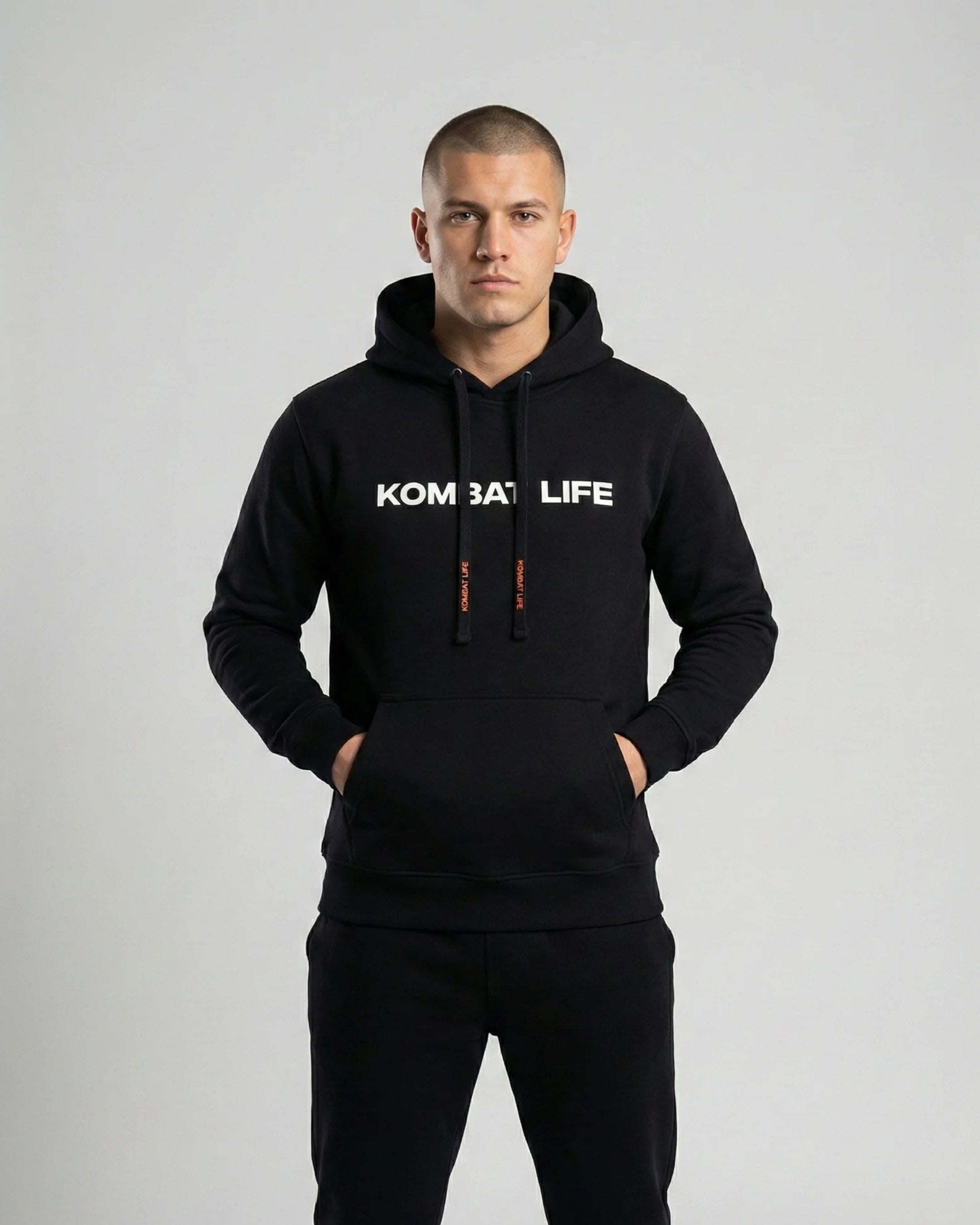 Hoodie negro Hunger Kombat Life sudadera con capucha streetwear fighter para entrenamiento y calle modelo vista delantera